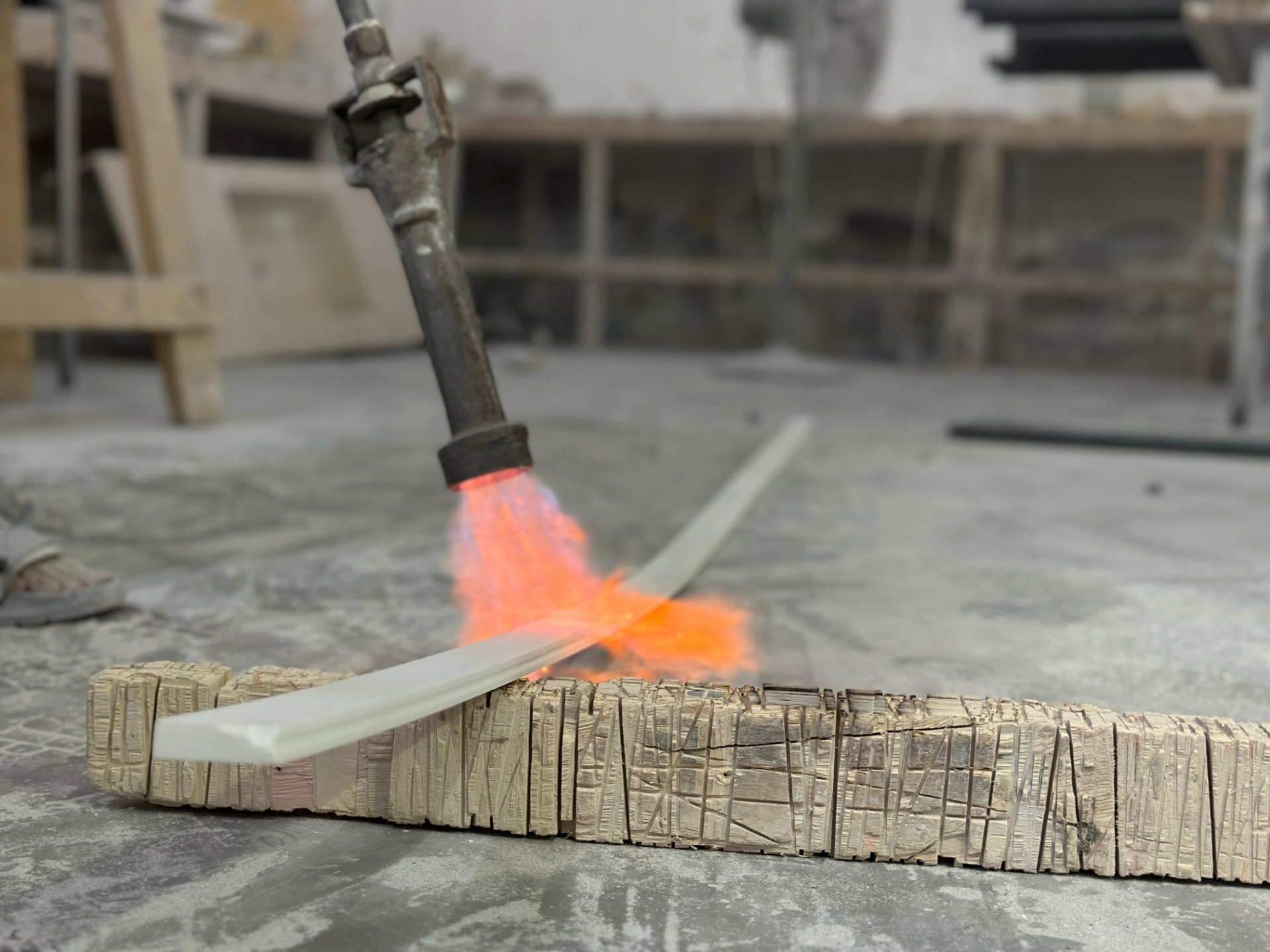 Heating a Corian strip with a torch to thermoform a curved edge